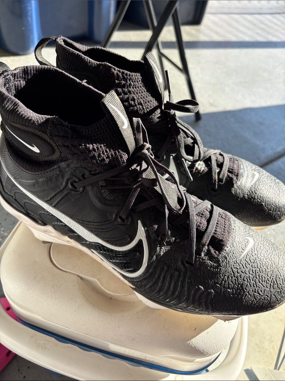 Nike Alpha Huarache NXT Baseball Cleats in black and white